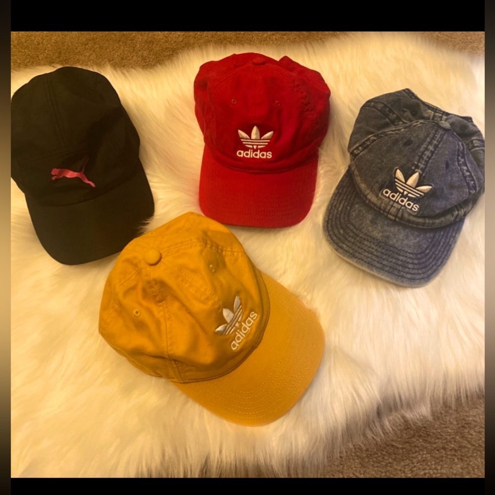Bundle of 4 hats 1 is puma and 3 adidas